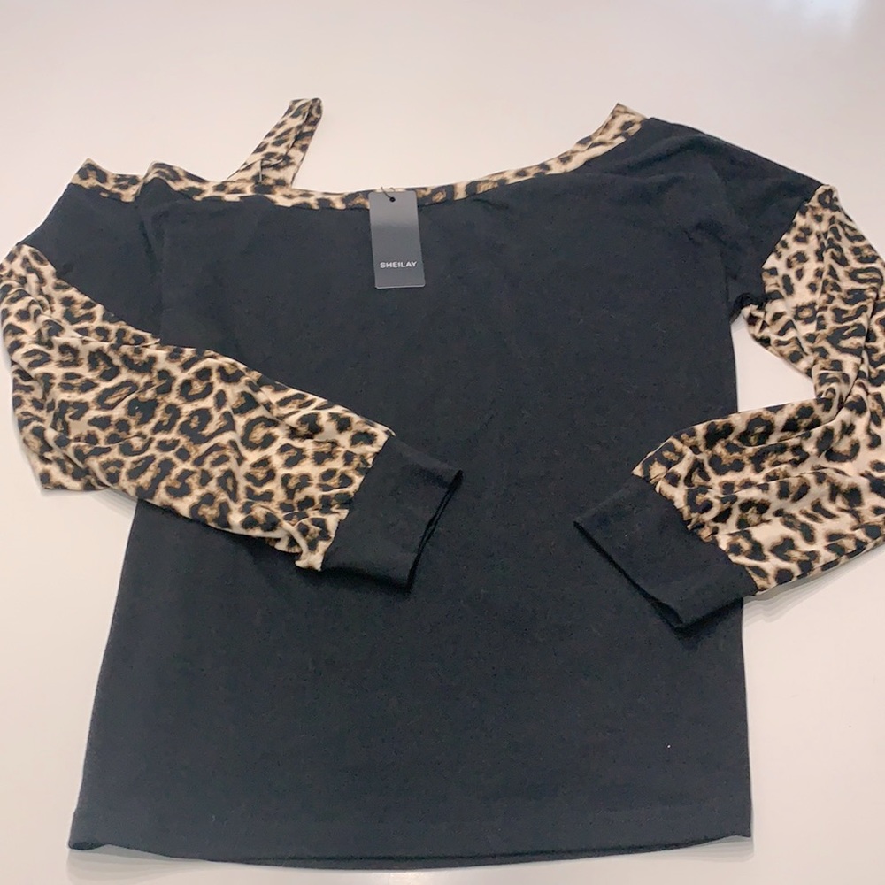 Sheilay top with cheetah print.